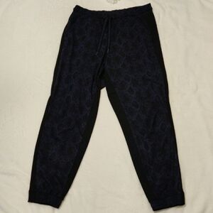 ATHLETA. Men's Black and Blue Patterned Pants